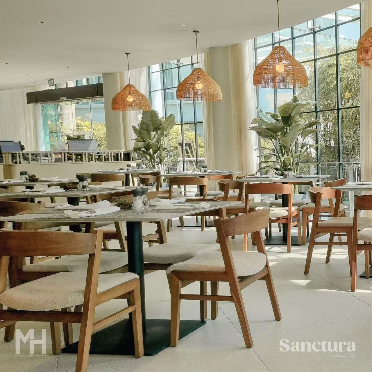 Restaurant furniture — wood dining chairs with rattan pendant lights